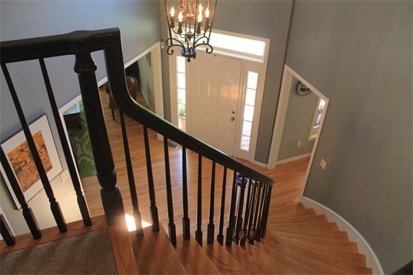 19 Pendulum Pass Hopkinton, MA 01748 - Photo 20 of 30 a view of staircase with railing and a chandelier