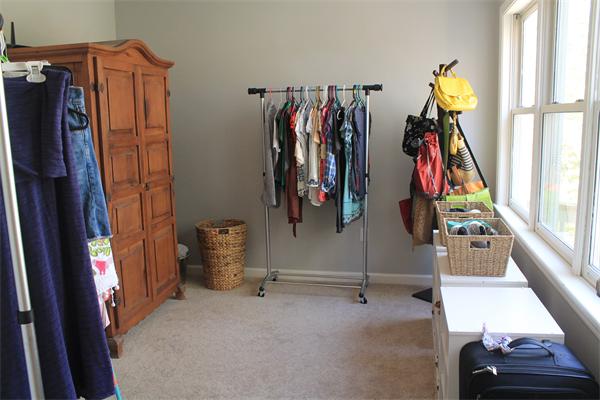 19 Pendulum Pass Hopkinton, MA 01748 - Photo 22 of 30 a view of walk in closet with clothes and shoes