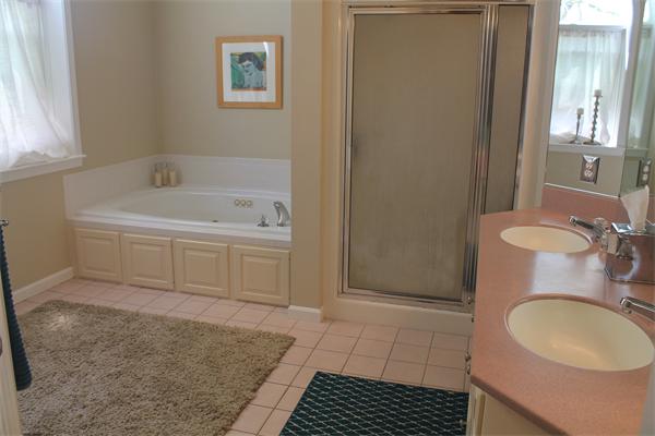 19 Pendulum Pass Hopkinton, MA 01748 - Photo 25 of 30 a bathroom with a granite countertop sink and a mirror