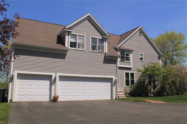 19 Pendulum Pass Hopkinton, MA 01748 - Photo 26 of 30 a view of a house with a yard and garage