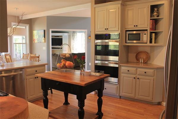 19 Pendulum Pass Hopkinton, MA 01748 - Photo 8 of 30 a kitchen with stainless steel appliances a stove a refrigerator and cabinets