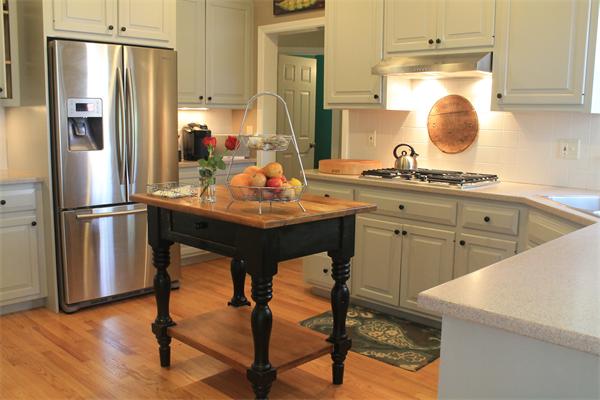 19 Pendulum Pass Hopkinton, MA 01748 - Photo 9 of 30 a kitchen with sink cabinets and refrigerator