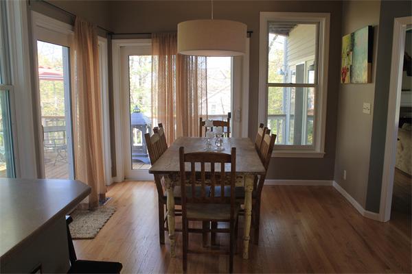 19 Pendulum Pass Hopkinton, MA 01748 - Photo 10 of 30 a view of a dining room with furniture window and wooden floor