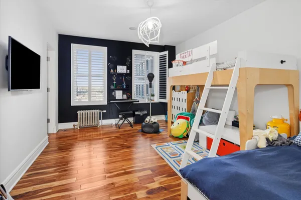 a room with furniture and a flat screen tv