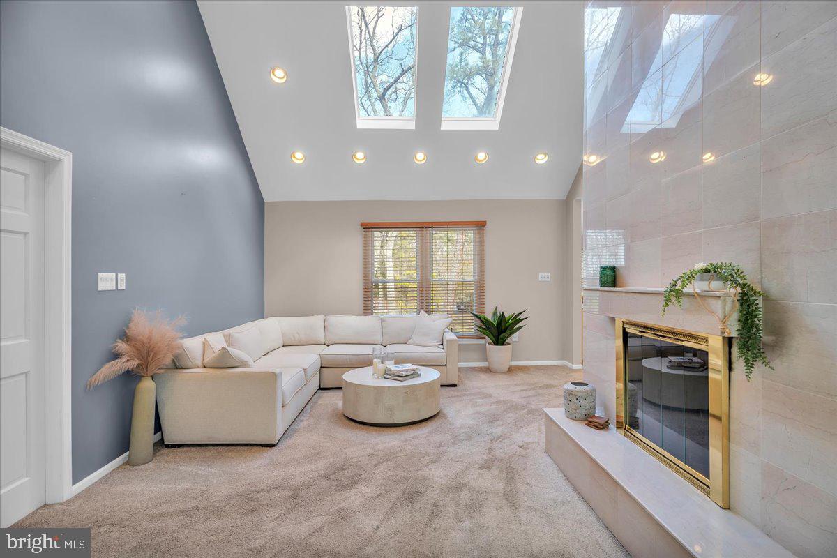 128 Bortons Road Marlton, NJ 08053 - Photo 12 of 48 a living room with furniture and a fireplace