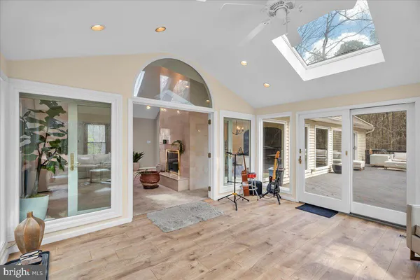a view of a livingroom with furniture window and wooden floor