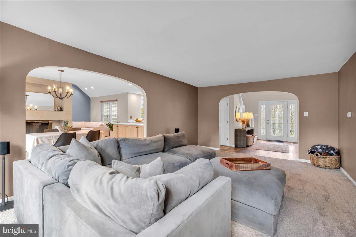 128 Bortons Road Marlton, NJ 08053 - Photo 3 of 48 a living room with furniture and a large mirror