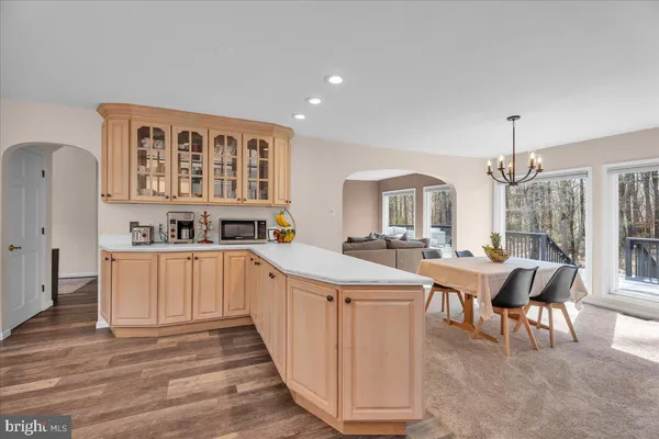 a kitchen with counter space cabinets and appliances