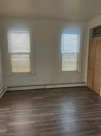 a bathroom with a tub and a sink