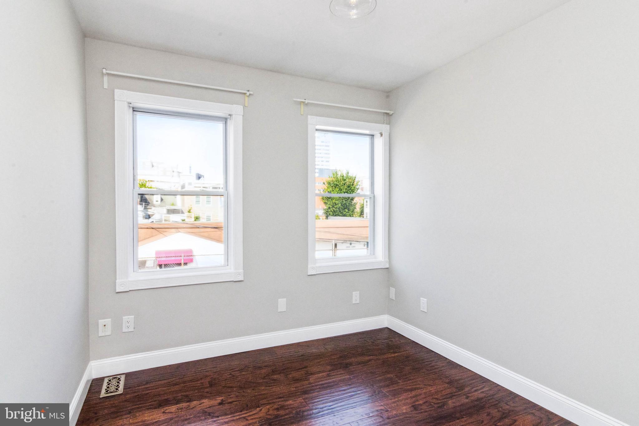 212 South Exeter Street Baltimore, MD 21202 - Photo 17 of 25 Rear Bedroom