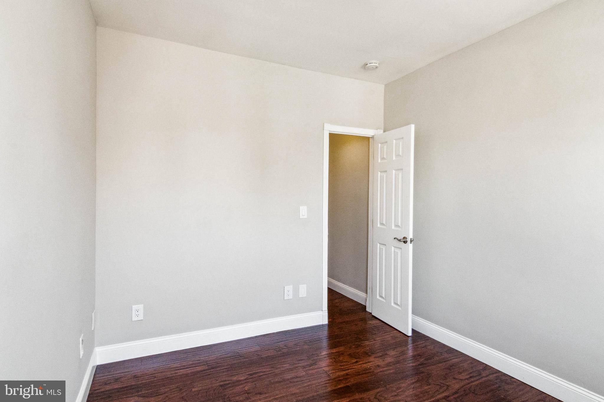 212 South Exeter Street Baltimore, MD 21202 - Photo 18 of 25 Rear bedroom