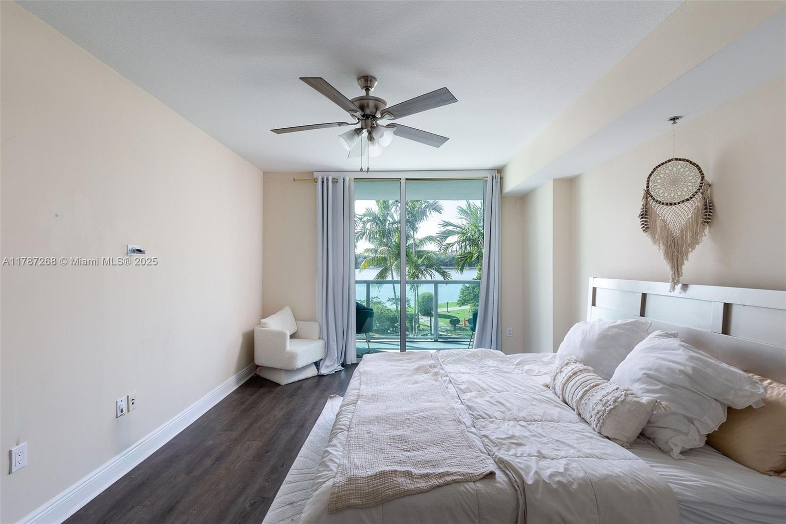 2681 North Flamingo Road, Unit TH4S Sunrise, FL 33323 - Photo 13 of 27 a bedroom with a bed and window