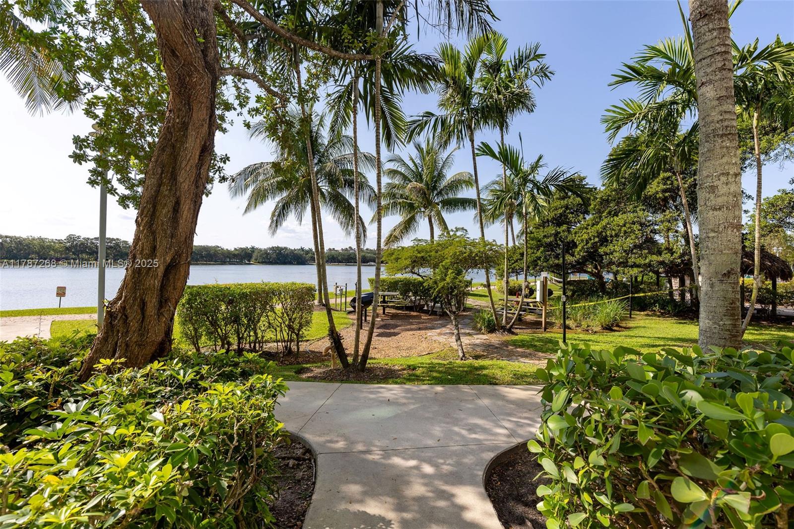 2681 North Flamingo Road, Unit TH4S Sunrise, FL 33323 - Photo 22 of 27 a view of a park with palm trees