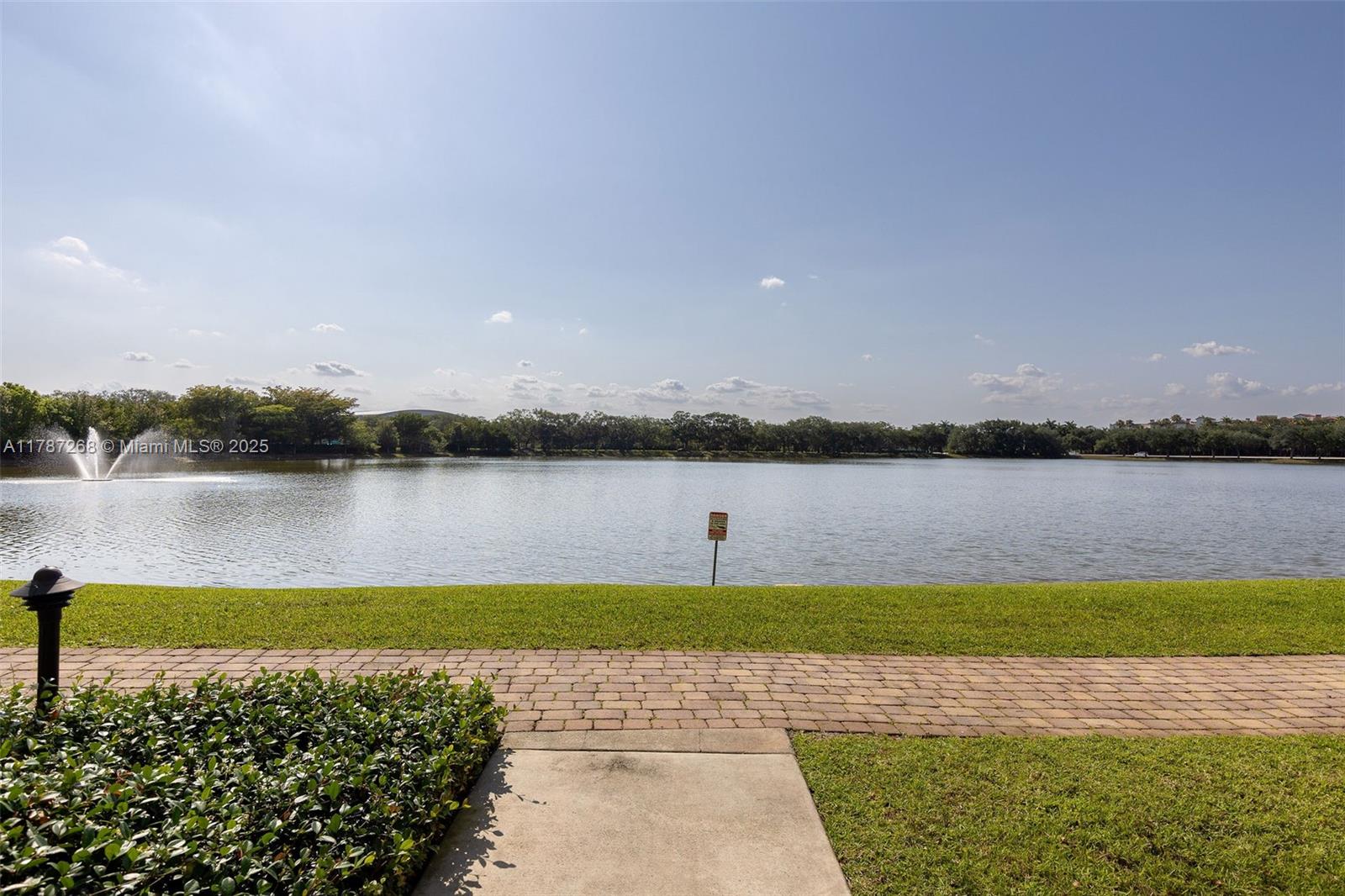 2681 North Flamingo Road, Unit TH4S Sunrise, FL 33323 - Photo 24 of 27 a view of a lake with houses in the back