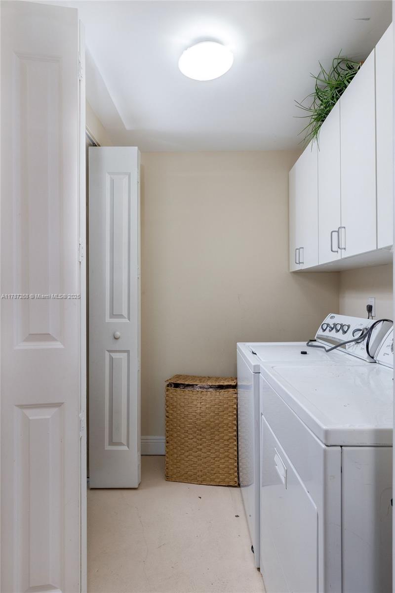 2681 North Flamingo Road, Unit TH4S Sunrise, FL 33323 - Photo 7 of 27 a utility room with dryer and washer