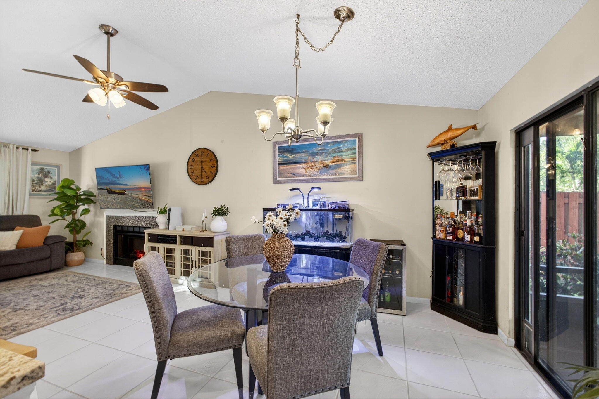 154 Rosewood Circle Jupiter, FL 33458 - Photo 14 of 43 a view of a dining room with furniture window and wooden floor