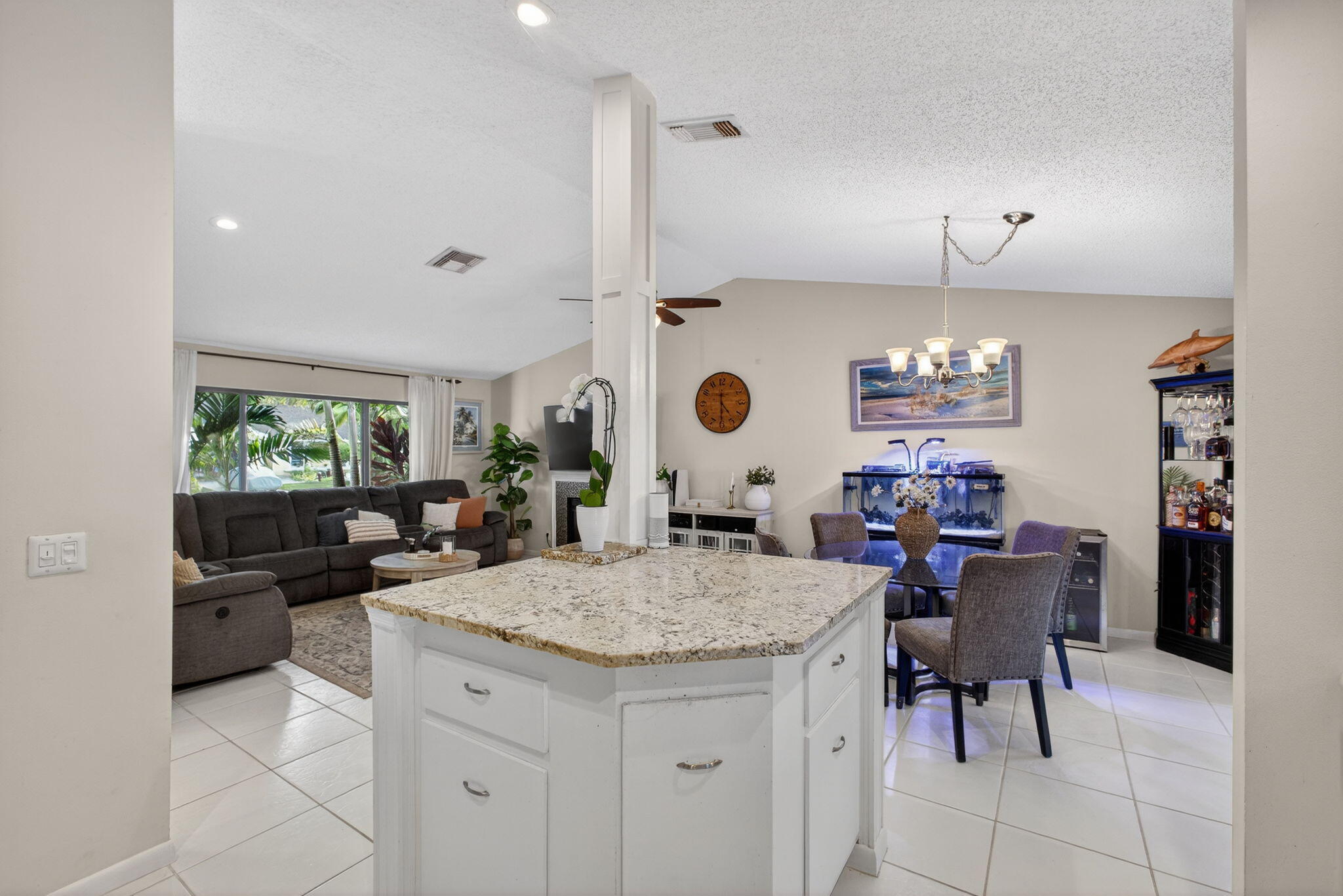 154 Rosewood Circle Jupiter, FL 33458 - Photo 19 of 43 a kitchen with a table and chairs