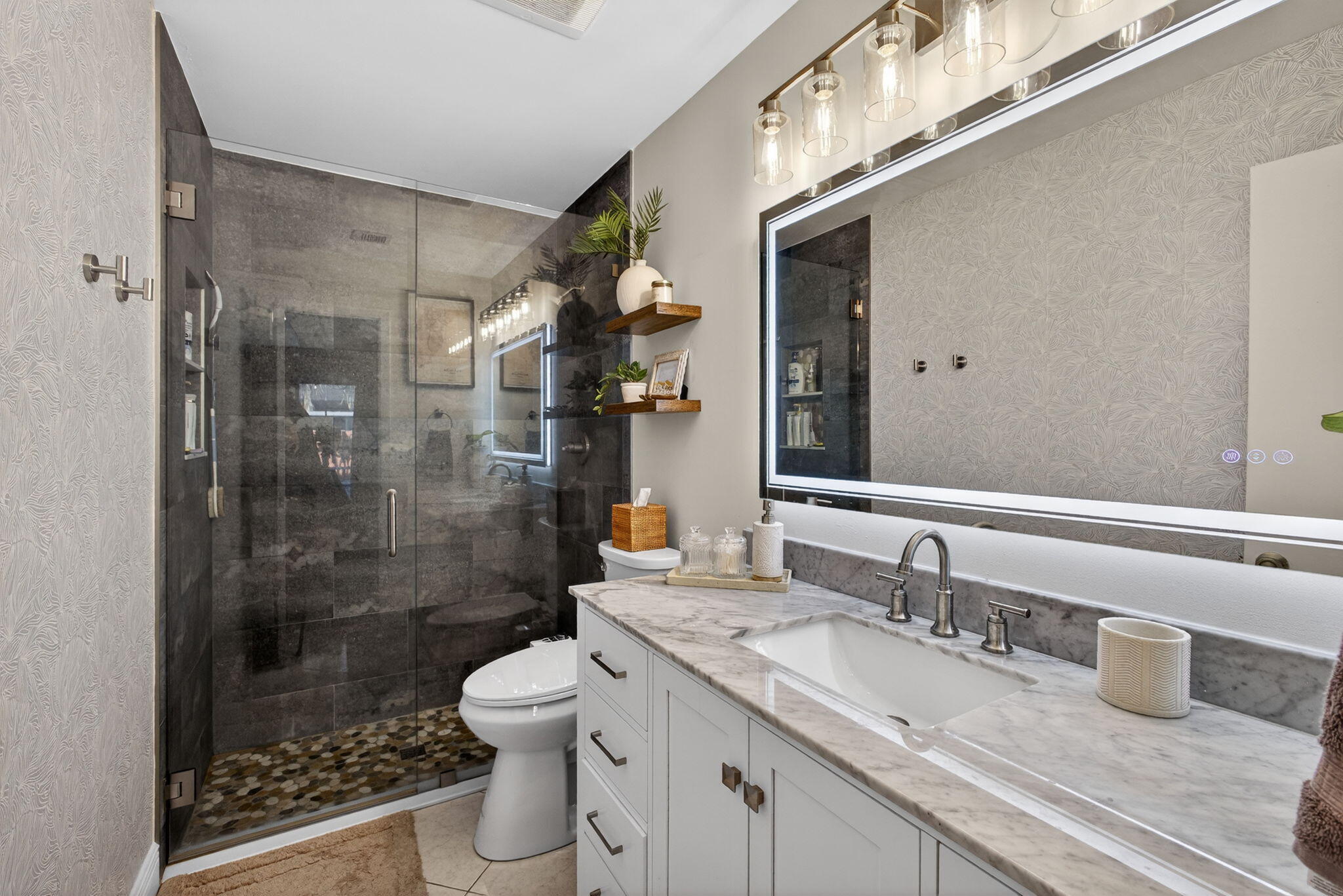 154 Rosewood Circle Jupiter, FL 33458 - Photo 22 of 43 a bathroom with a granite countertop sink toilet and shower