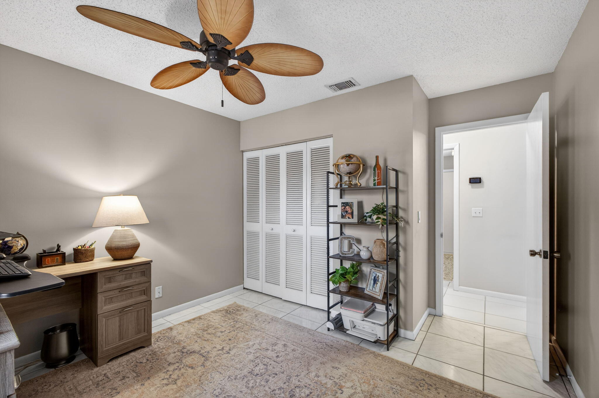 154 Rosewood Circle Jupiter, FL 33458 - Photo 24 of 43 a room with furniture