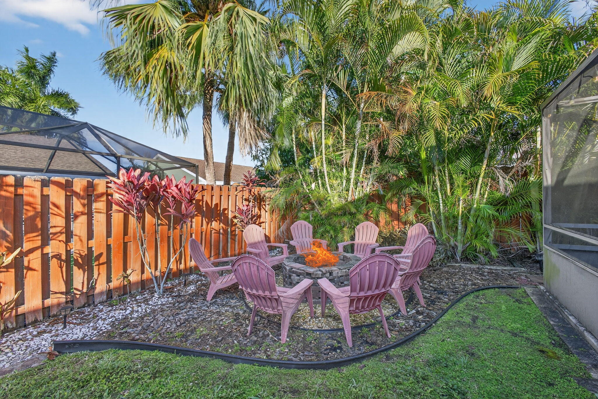 154 Rosewood Circle Jupiter, FL 33458 - Photo 34 of 43 a view of a swimming pool with a sitting area