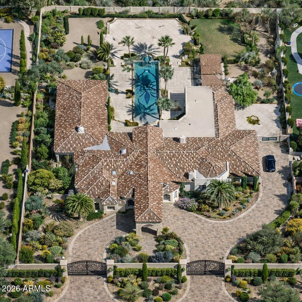 6525 North Lost Dutchman Road Paradise Valley, AZ 85253 - Photo 3 of 81 an aerial view of houses with outdoor space