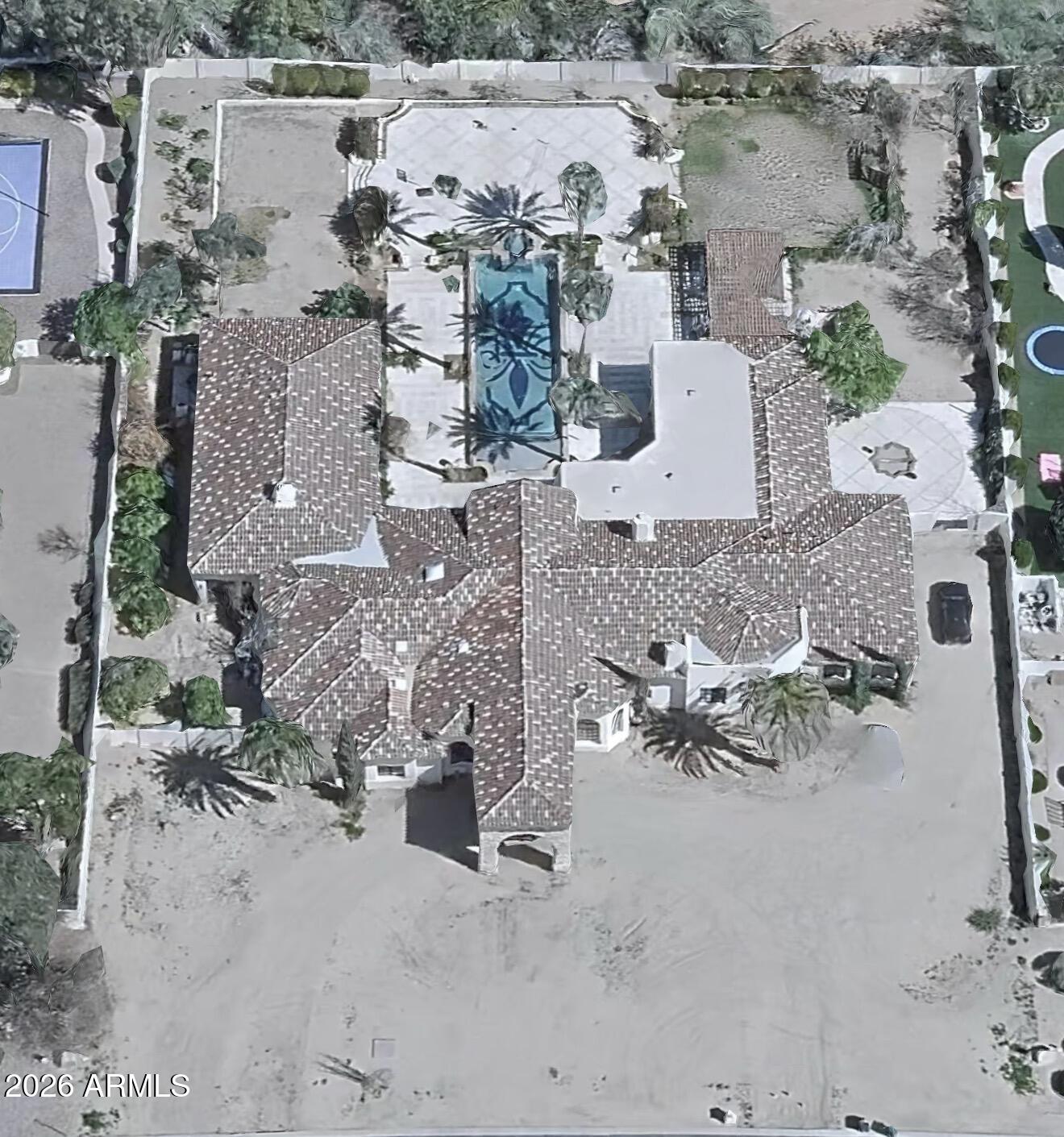 6525 North Lost Dutchman Road Paradise Valley, AZ 85253 - Photo 4 of 81 an aerial view of multiple houses with outdoor space
