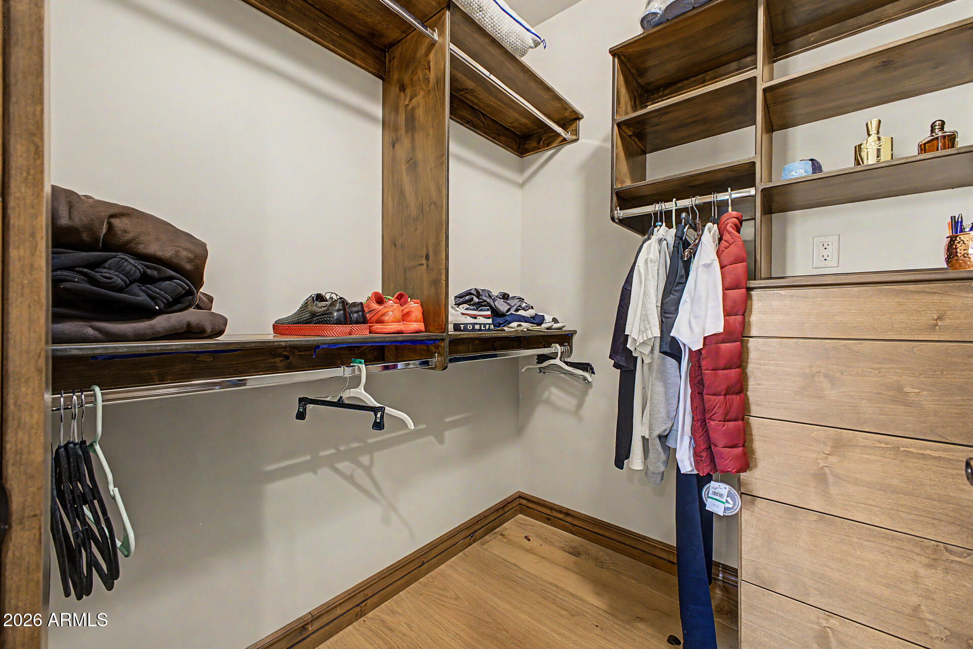 6525 North Lost Dutchman Road Paradise Valley, AZ 85253 - Photo 53 of 81 a view of walk in closet with clothes and shoes