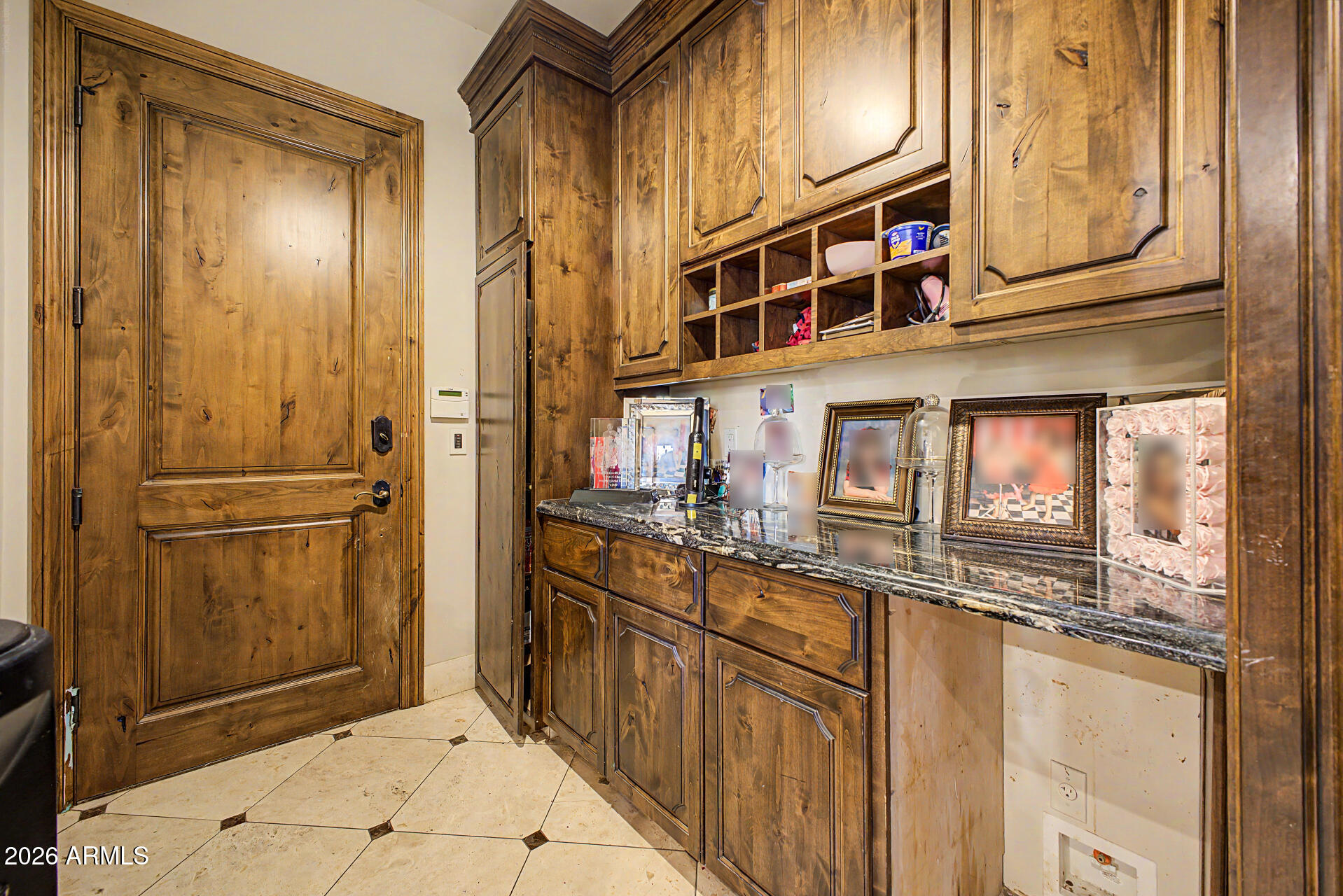 6525 North Lost Dutchman Road Paradise Valley, AZ 85253 - Photo 67 of 81 a view of a kitchen with stainless steel appliances granite countertop a refrigerator and a stove