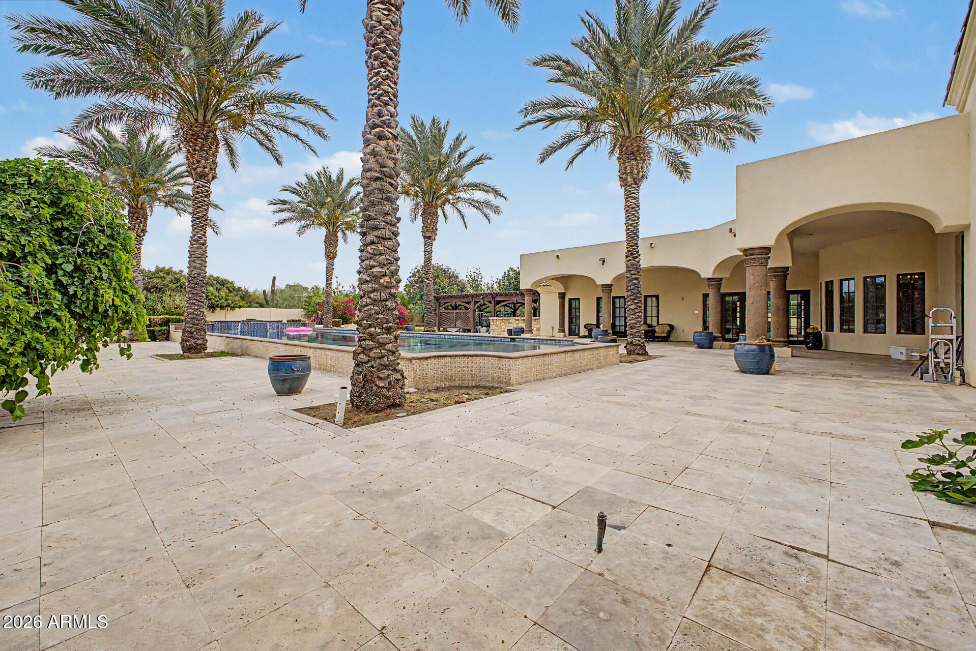 6525 North Lost Dutchman Road Paradise Valley, AZ 85253 - Photo 72 of 81 a view of multiple houses with palm trees