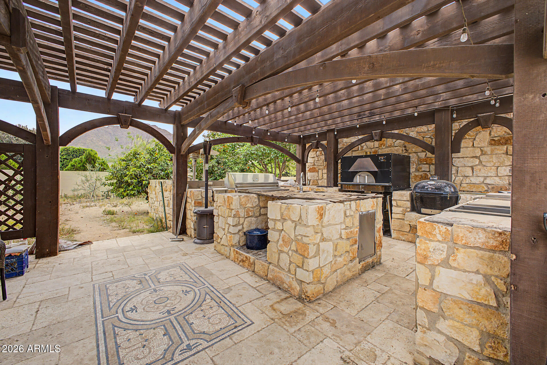 6525 North Lost Dutchman Road Paradise Valley, AZ 85253 - Photo 79 of 81 a view of a porch with a wooden fence