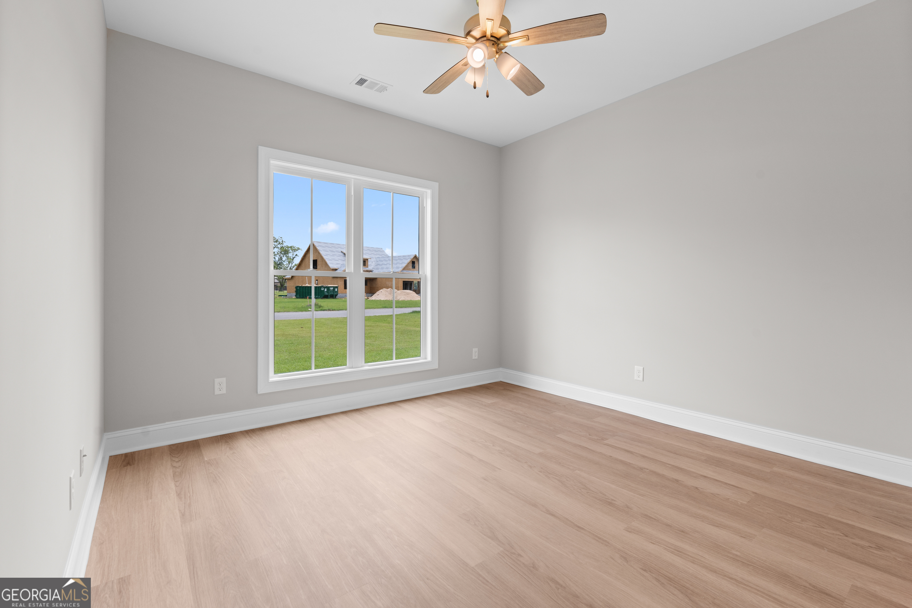 10 Honeysuckle Drive Claxton, GA 30417 - Photo 23 of 42 a view of an empty room with a window