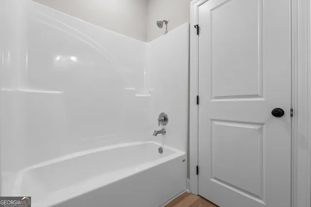 a bathroom with a bathtub