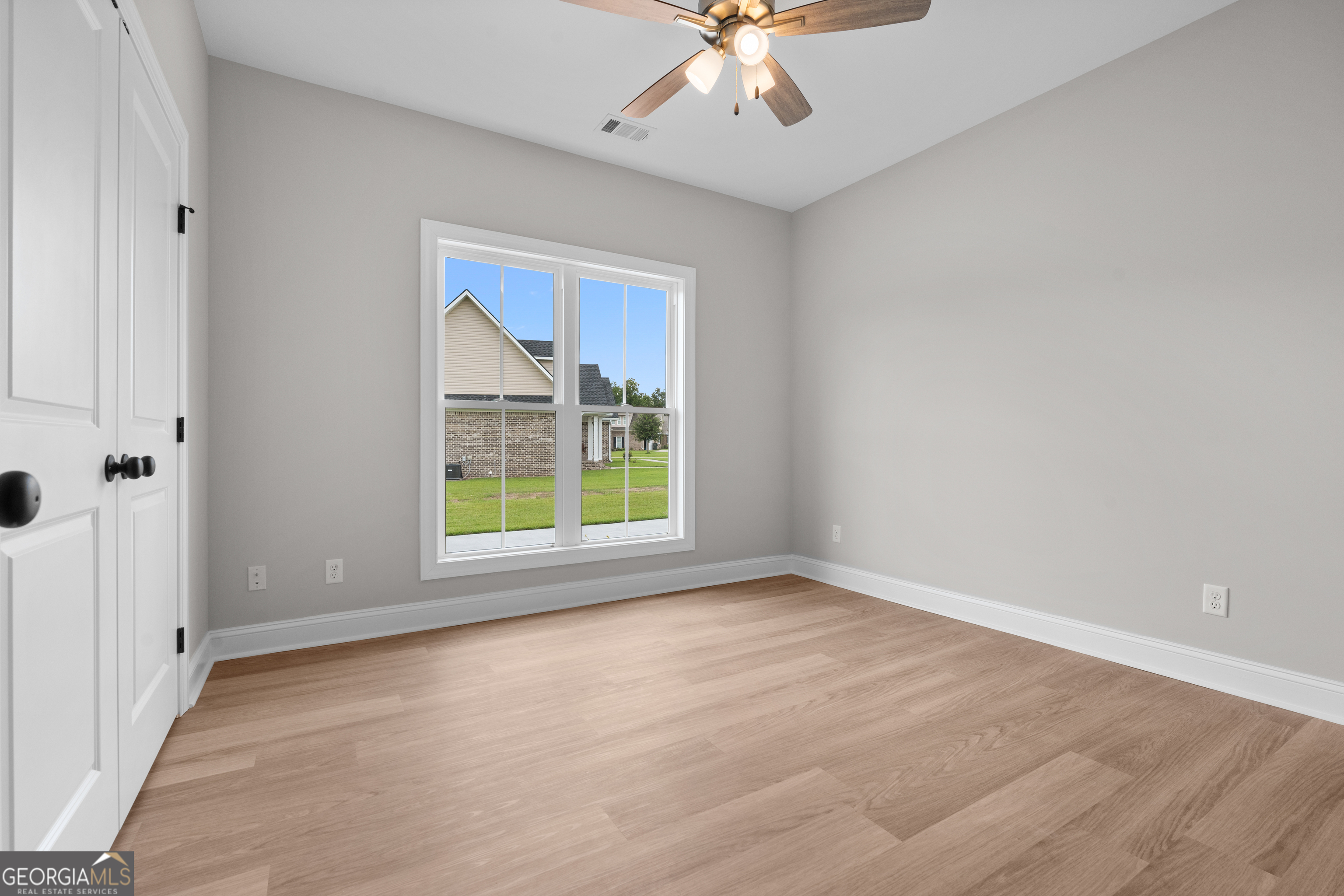 10 Honeysuckle Drive Claxton, GA 30417 - Photo 26 of 42 a view of an empty room with a window