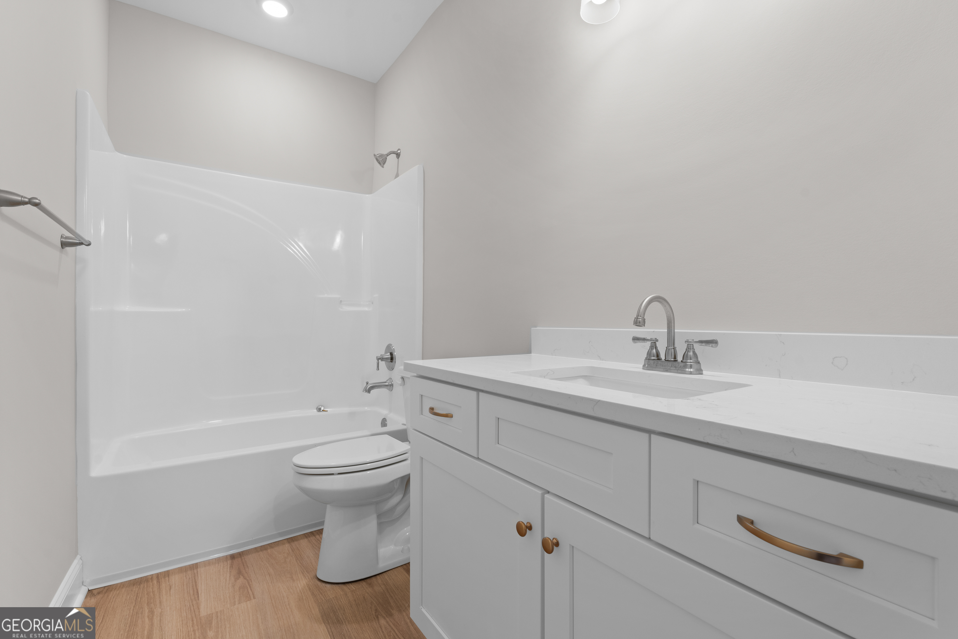 10 Honeysuckle Drive Claxton, GA 30417 - Photo 27 of 42 a bathroom with a sink a toilet and shower