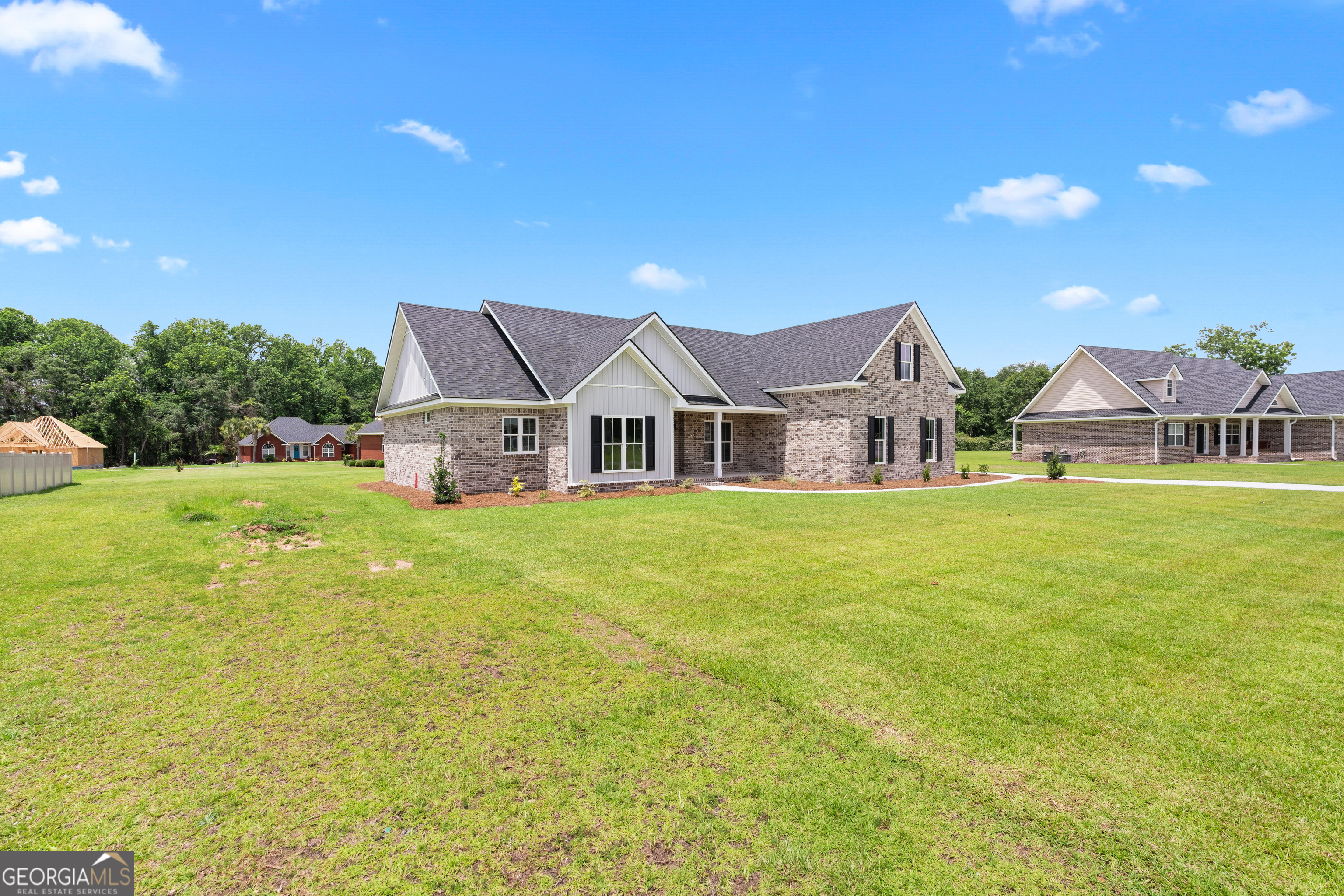 10 Honeysuckle Drive Claxton, GA 30417 - Photo 3 of 42 a view of house with garden