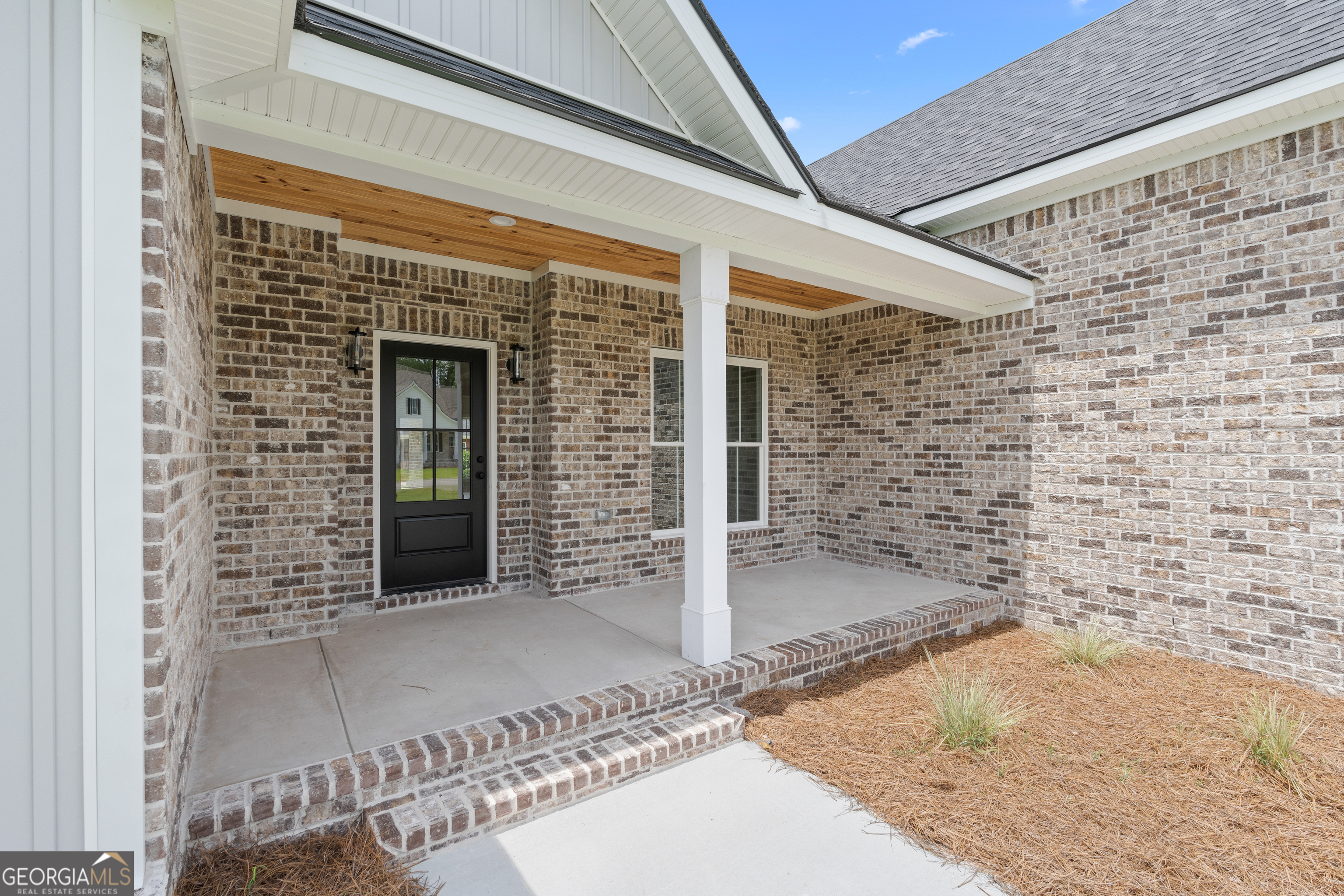 10 Honeysuckle Drive Claxton, GA 30417 - Photo 5 of 42 a view of front door of house