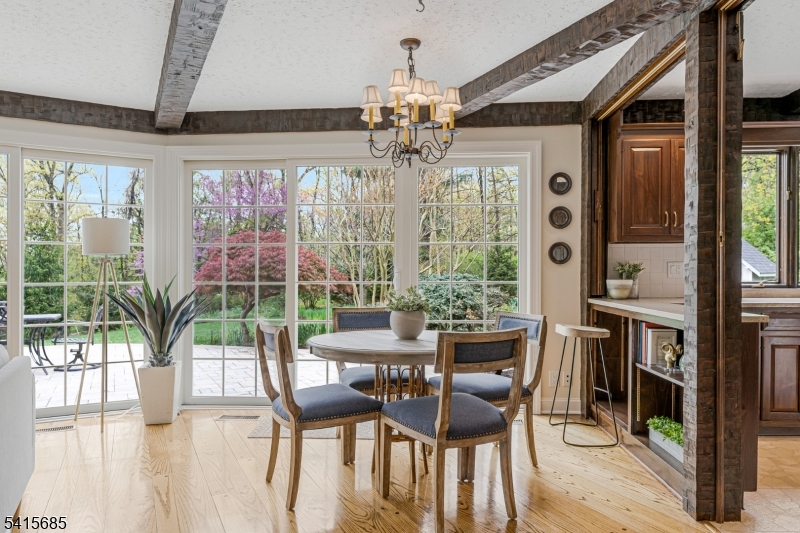167 Ridge Road Watchung, NJ 07069 - Photo 11 of 50 a view of a dining room with furniture window and outside view