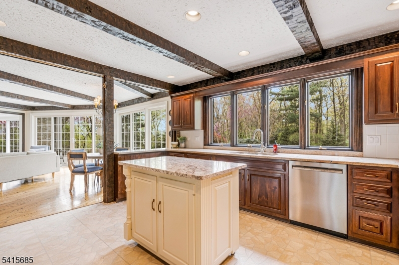 167 Ridge Road Watchung, NJ 07069 - Photo 17 of 50 a open kitchen with granite countertop a sink and stove