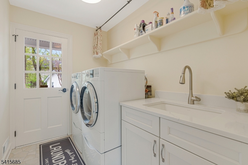 167 Ridge Road Watchung, NJ 07069 - Photo 24 of 50 a bathroom with a sink and a mirror