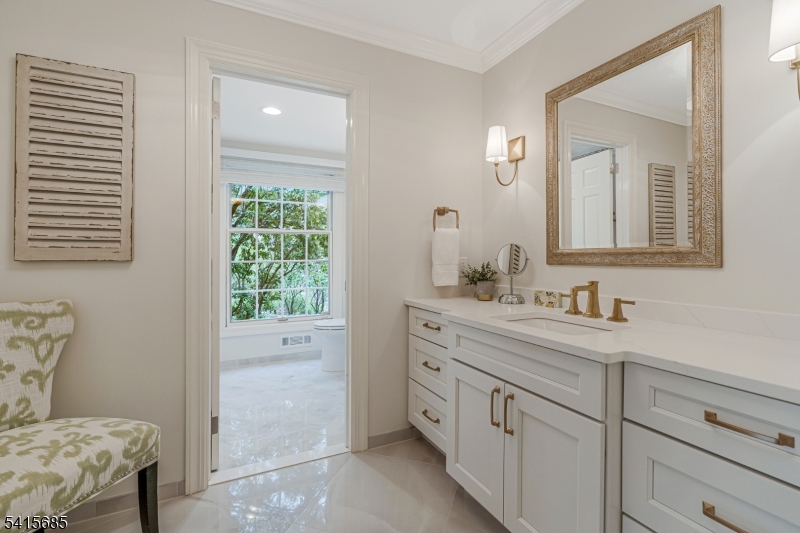 167 Ridge Road Watchung, NJ 07069 - Photo 30 of 50 a bathroom with a sink and a mirror