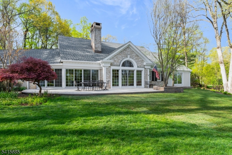 167 Ridge Road Watchung, NJ 07069 - Photo 39 of 50 a front view of a house with a garden