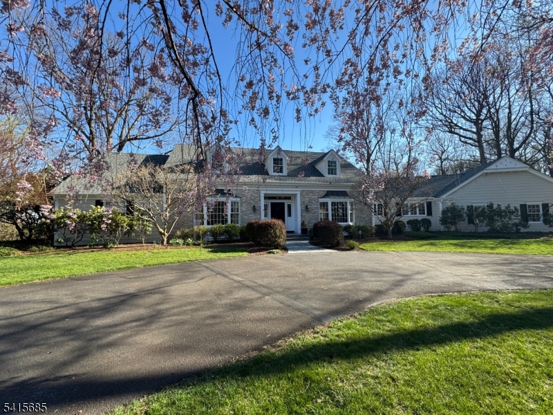 167 Ridge Road Watchung, NJ 07069 - Photo 50 of 50 a front view of a house with a yard and swimming pool