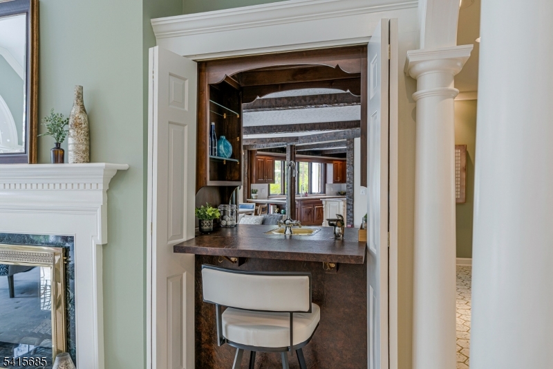167 Ridge Road Watchung, NJ 07069 - Photo 6 of 50 a kitchen with a sink and a mirror