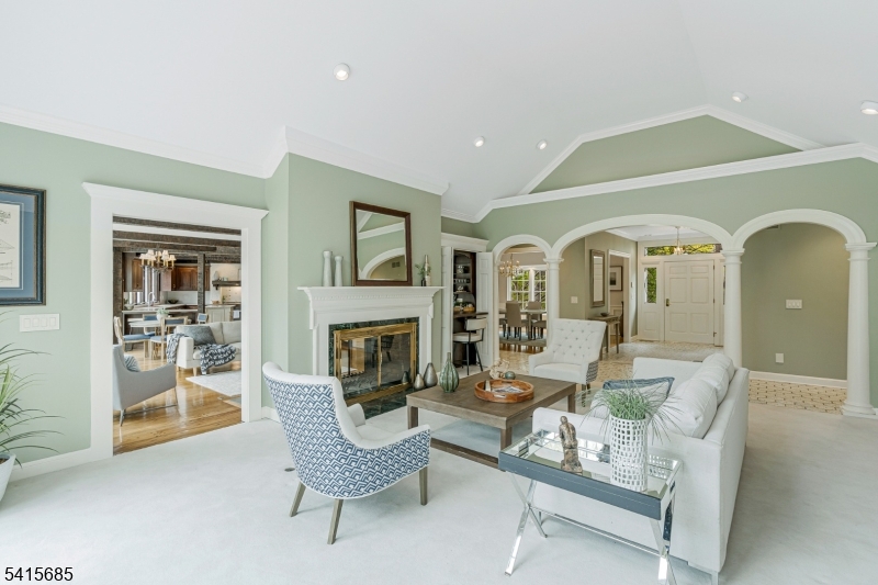 167 Ridge Road Watchung, NJ 07069 - Photo 7 of 50 a living room with furniture and a fireplace