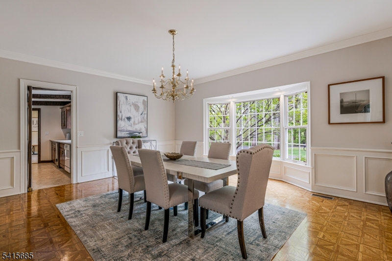 167 Ridge Road Watchung, NJ 07069 - Photo 8 of 50 a view of a dining room with furniture window and wooden floor