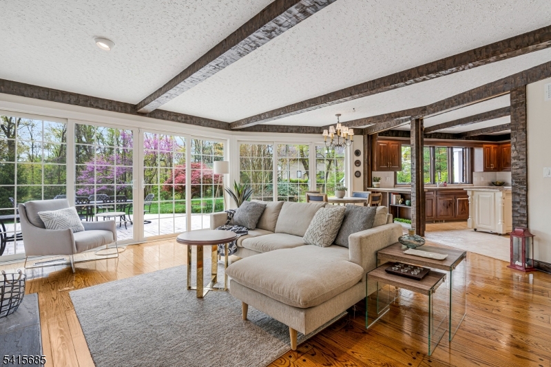167 Ridge Road Watchung, NJ 07069 - Photo 10 of 50 a living room with furniture and a large window