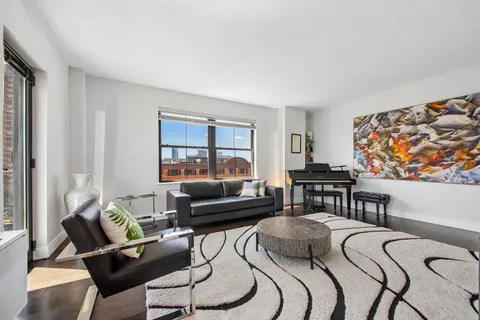 a living room with furniture and a couch