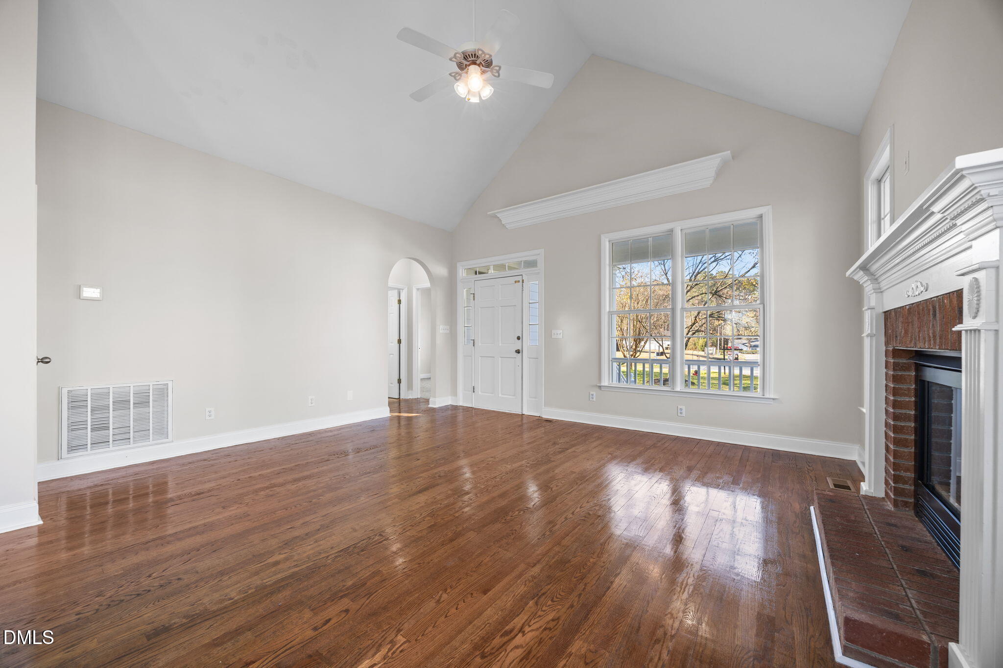 118 Kayleigh Court Willow Spring, NC 27592 - Photo 11 of 37 wooden floor in an empty room with a window