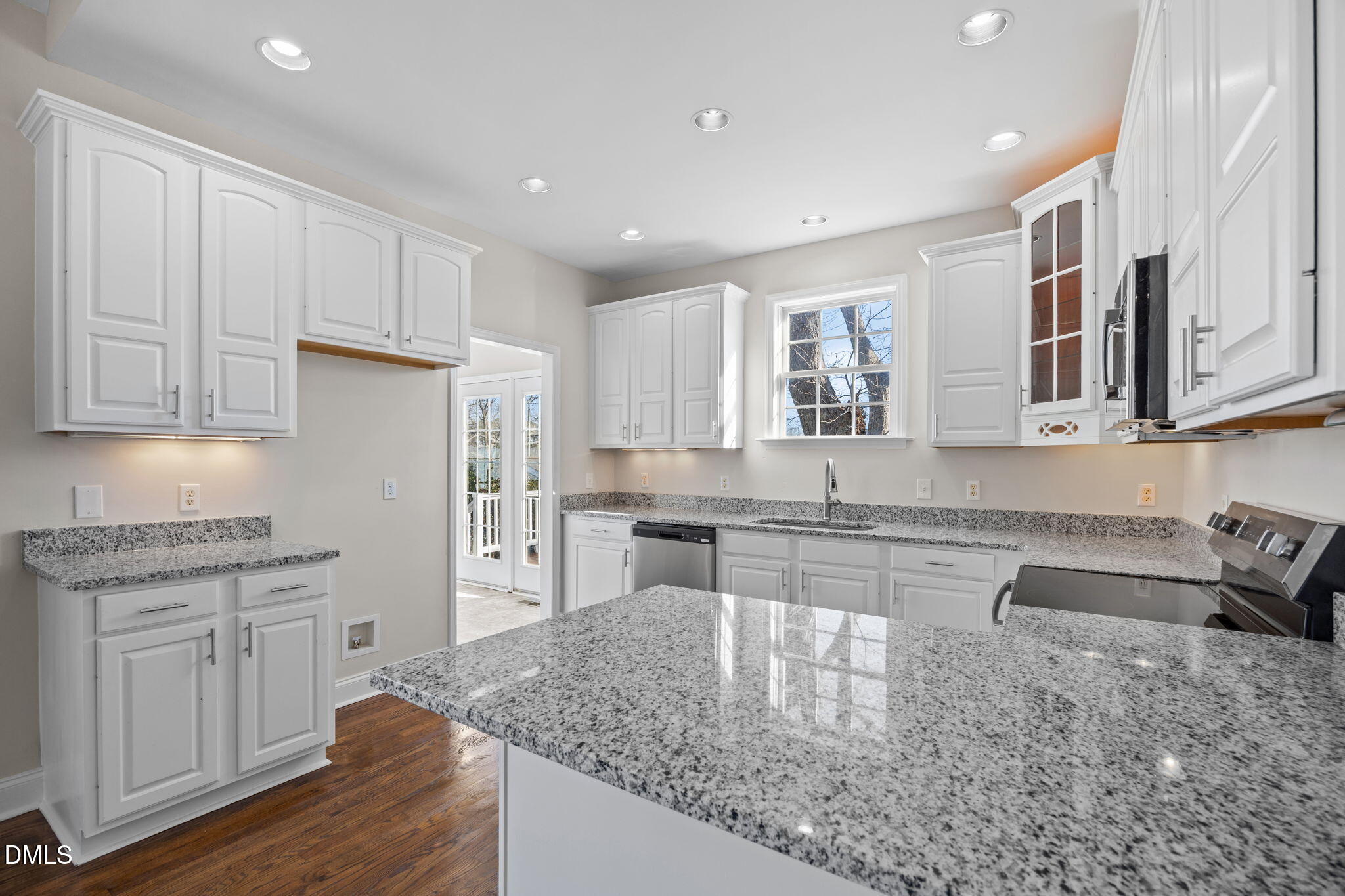 118 Kayleigh Court Willow Spring, NC 27592 - Photo 15 of 37 a kitchen with stainless steel appliances granite countertop a sink stove and refrigerator