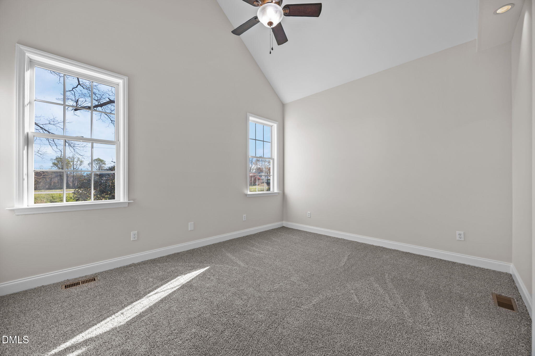 118 Kayleigh Court Willow Spring, NC 27592 - Photo 23 of 37 an empty room with a window and a ceiling fan
